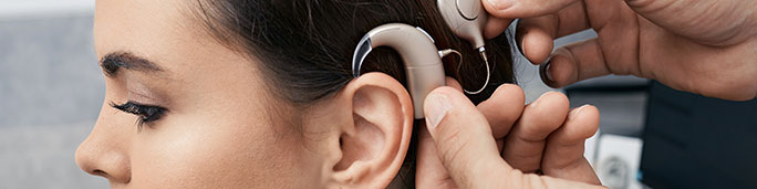 A patient trying a cochlear implant.